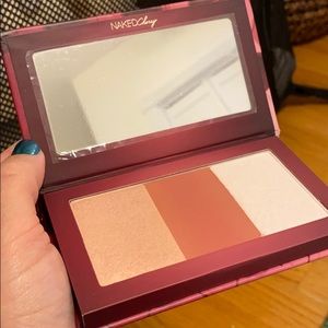 Never used Urban Decay blush and highlight palette